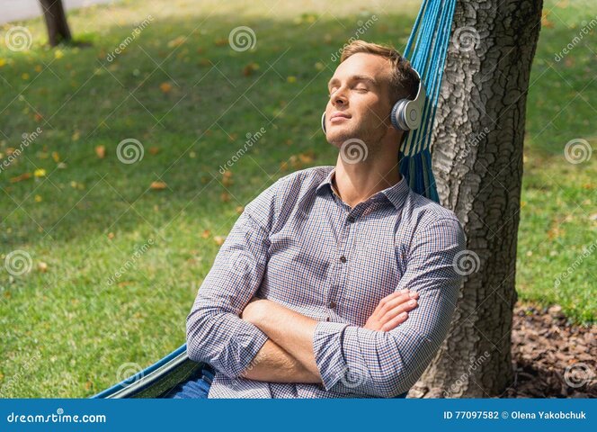 smiling-guy-relaxing-park-good-music-young-man-hammock-listening-to-music-headphones-77097582...jpeg
